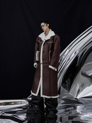 Oversized faux fur jacket featuring bold surface pleats and topstitching details for an edgy urban look