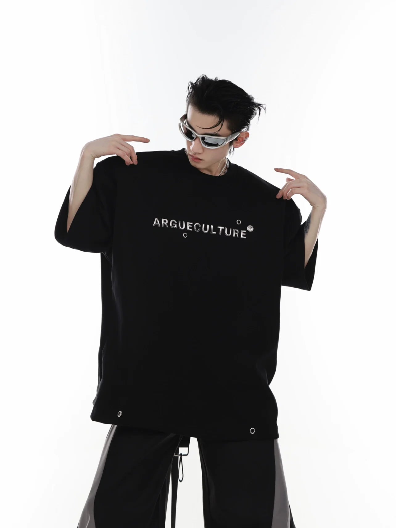 Front view of oversized graphic print tee with avant-garde drop shoulder design for streetwear style