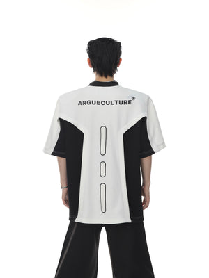 Oversized graphic tee with padded shoulders, featuring bold geometric print and urban streetwear style