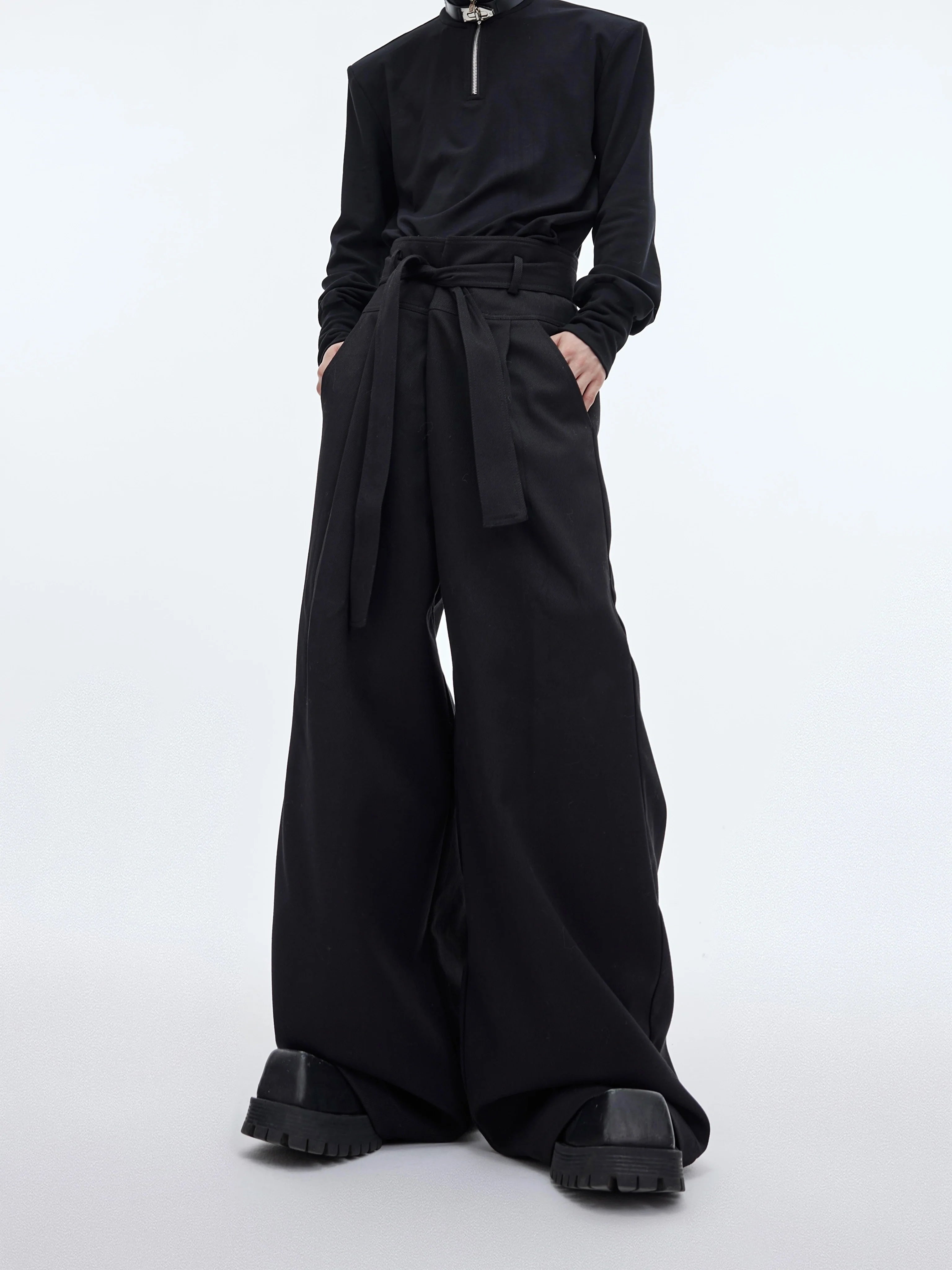Oversized high-waist trousers with unique spliced streamer details, wide-leg streetwear pants for urban fashion