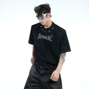 Oversized drop-shoulder tee featuring pearl bead embroidery logo, perfect for urban streetwear style