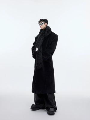 Men's oversized plaid wool coat featuring bold patchwork design and long trench silhouette for streetwear fashion