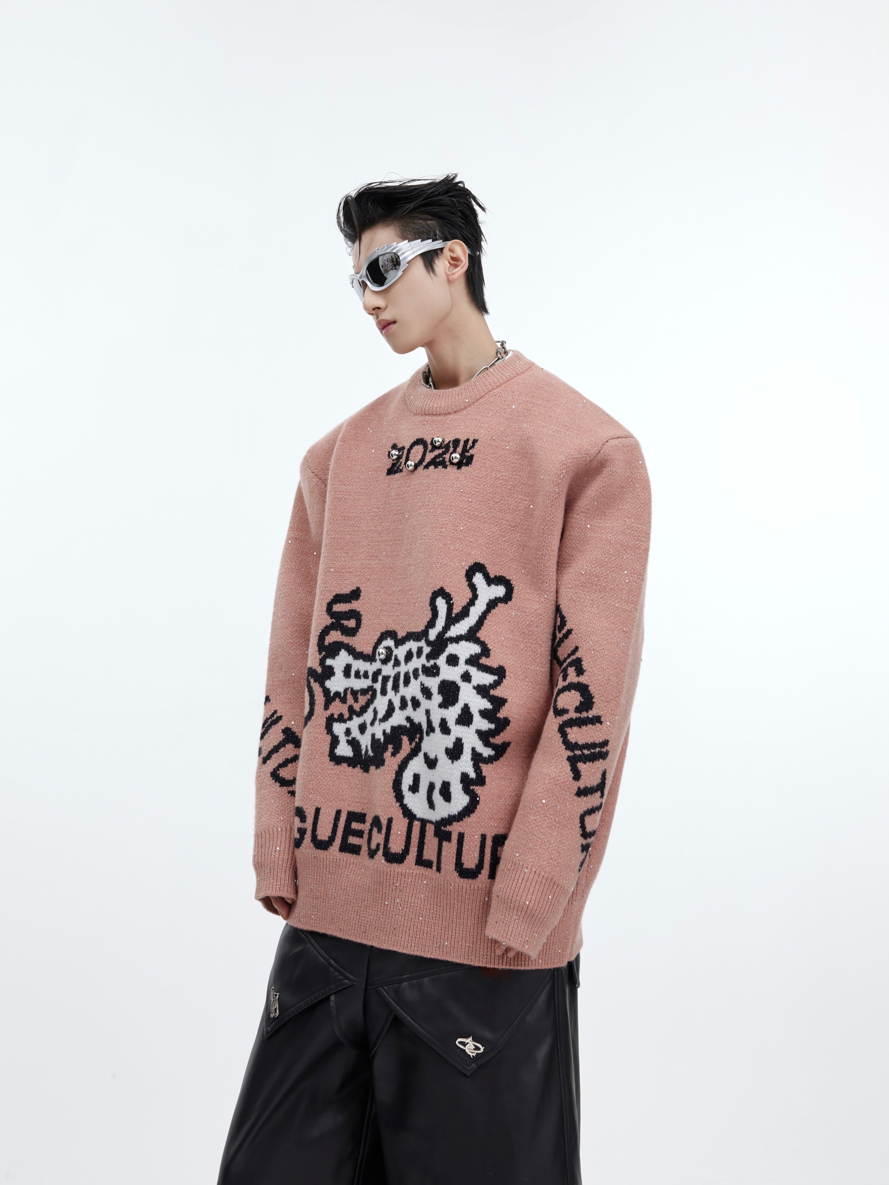 Oversized deconstructed sweater featuring urban graffiti-inspired prints and relaxed streetwear silhouette