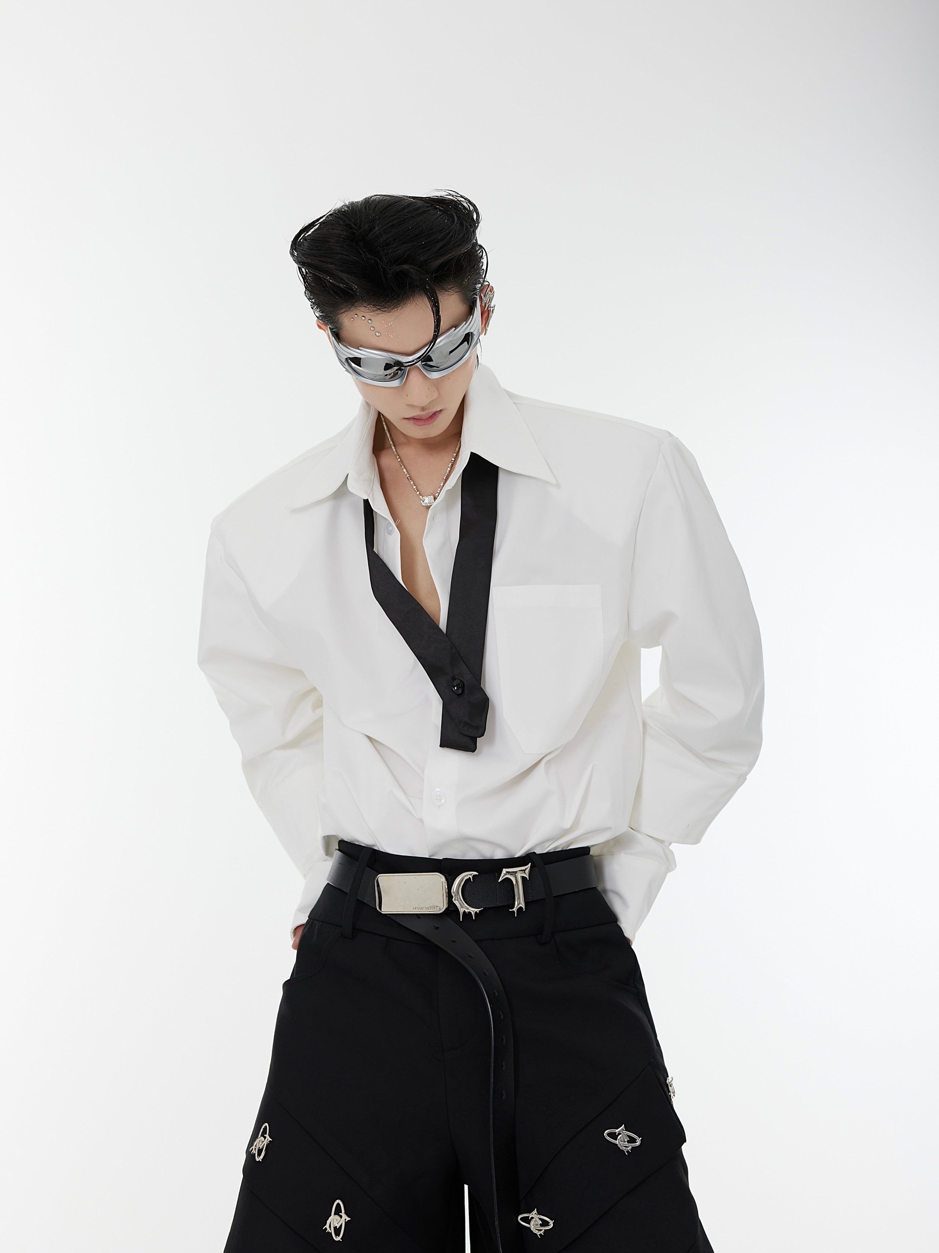 Oversized drop shoulder shirt with unique split cuffs and layered design, perfect for streetwear fashion