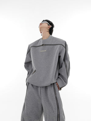 Front and back view of deconstructed zip hoodie set with urban fashion styling