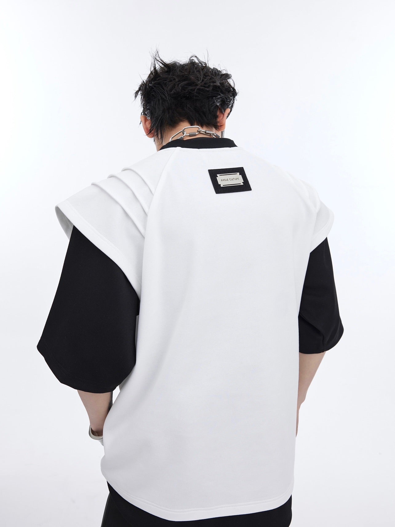 Model wearing the oversized distressed print tee showing its structured yet breathable premium fabric