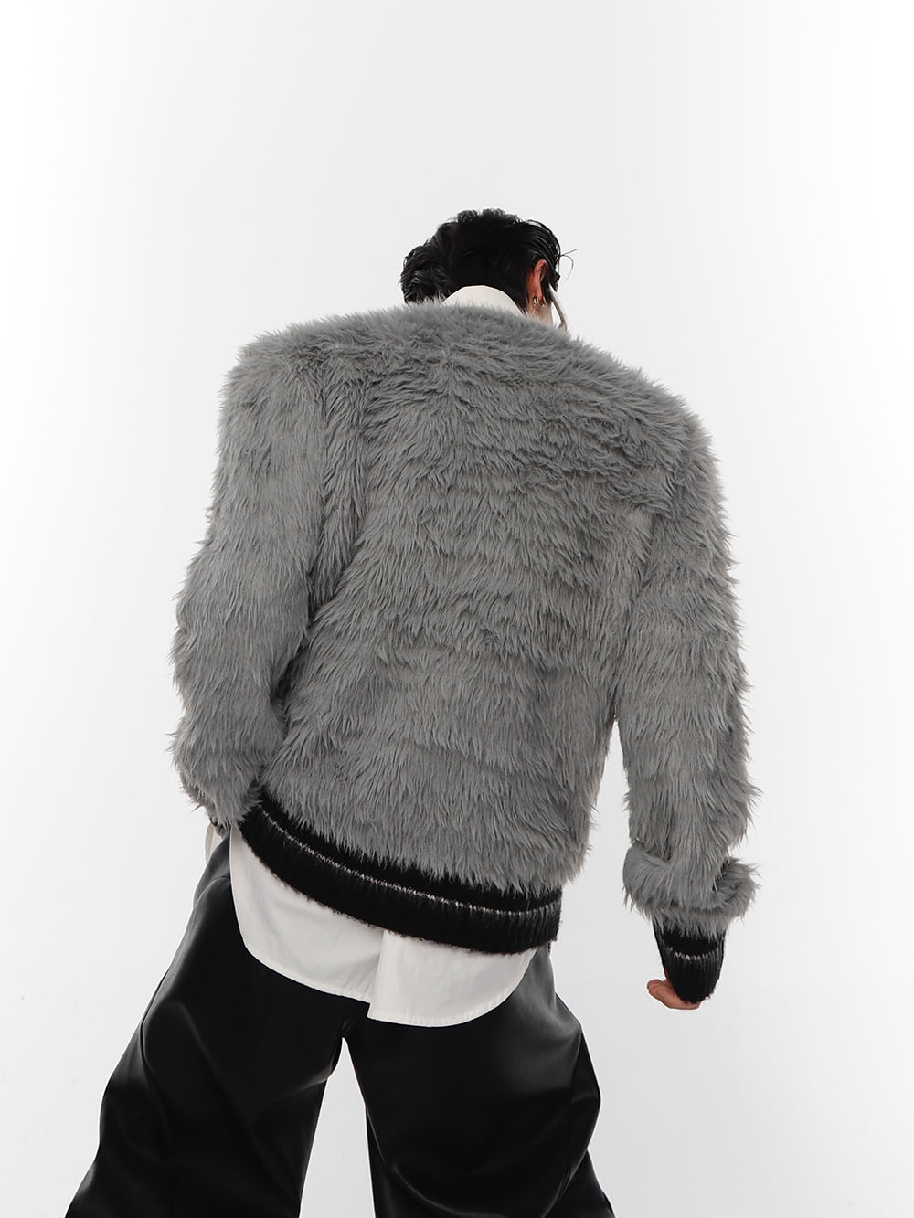 Oversized knit sweater showcasing romantic nonchalance style with textured fabric