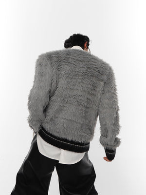 Oversized knit sweater showcasing romantic nonchalance style with textured fabric