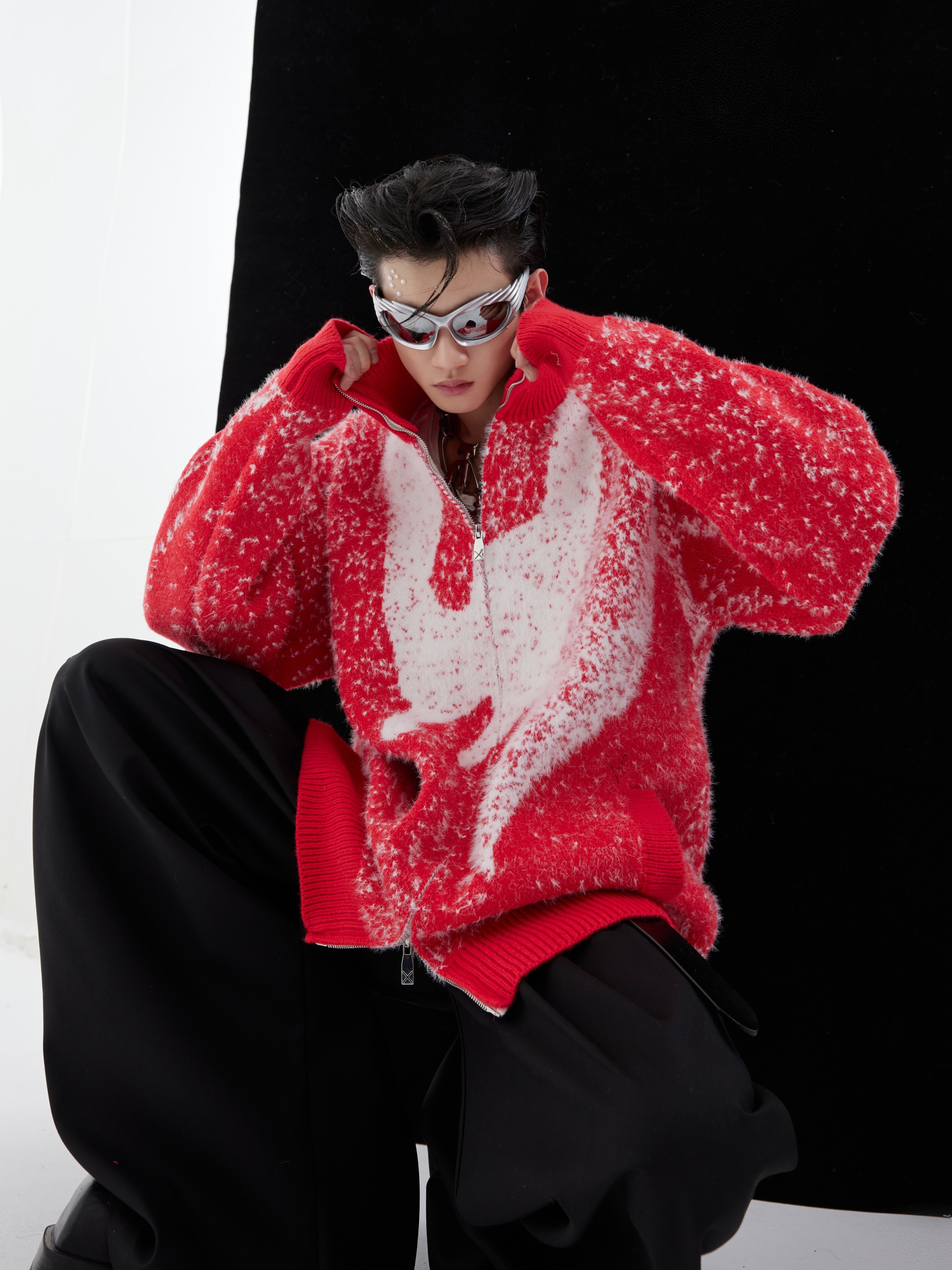 Stylish streetwear look featuring the trendy dragon year knit sweater worn with urban fashion accessories
