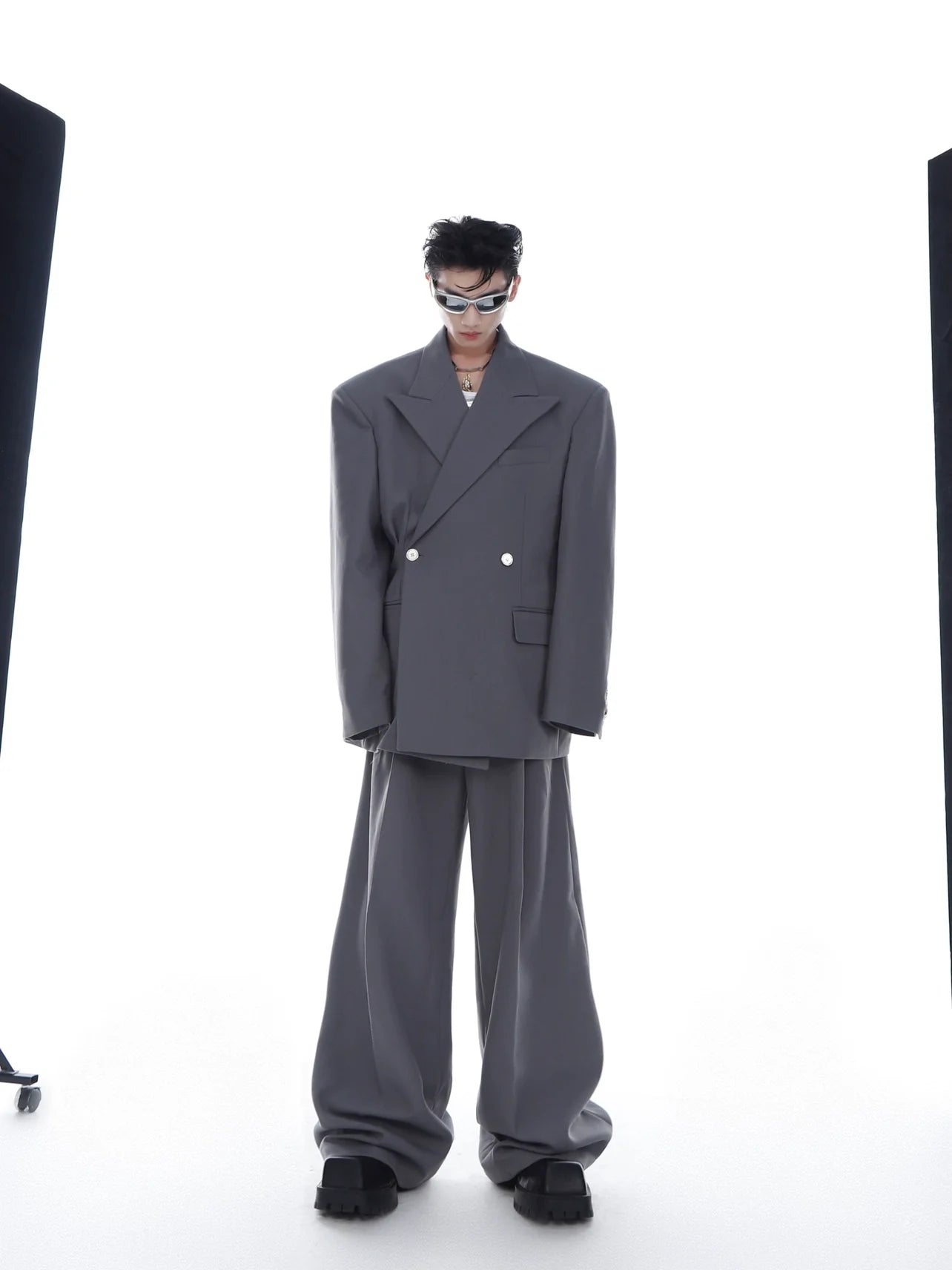Front view of oversized unisex blazer with drop shoulder design in stylish twill fabric