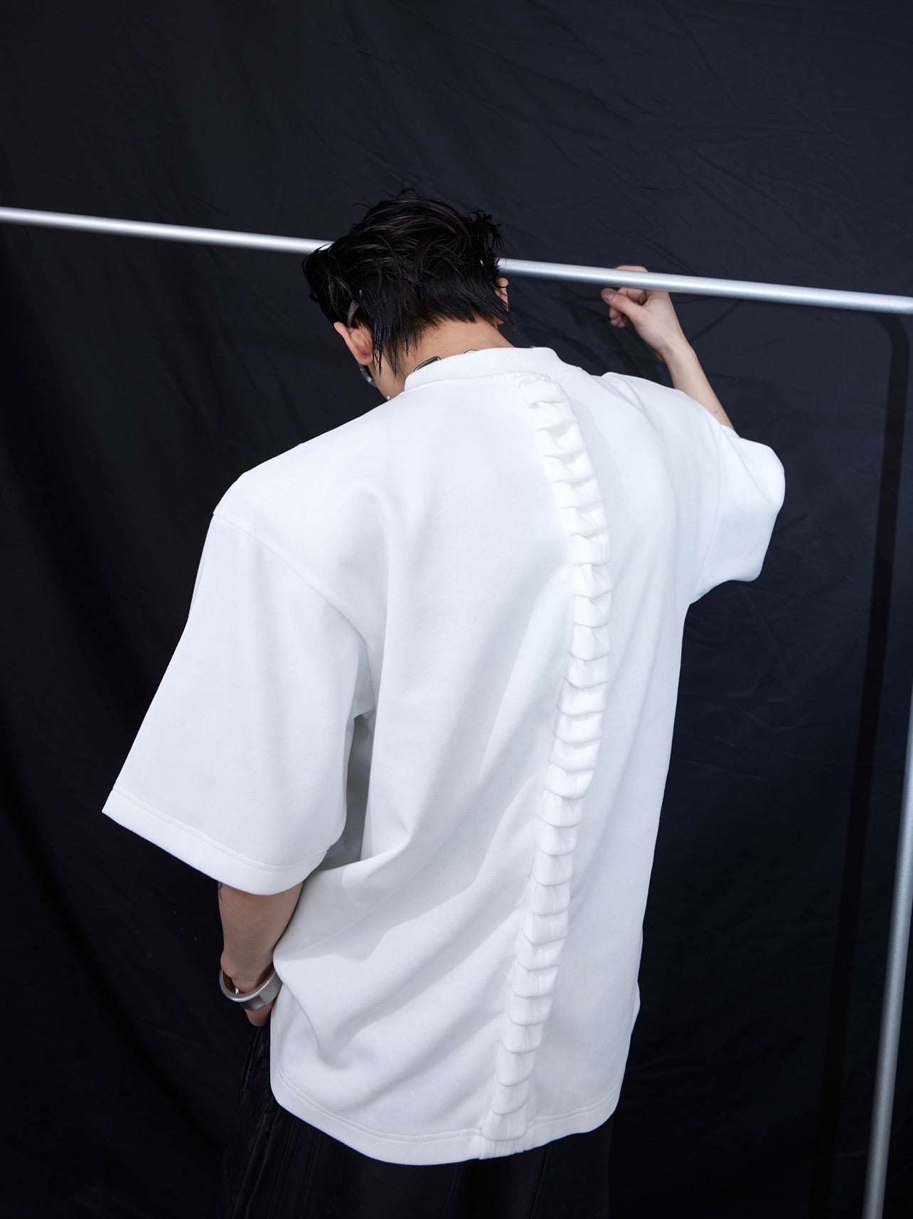 Heavyweight patchwork streetwear t-shirt featuring deconstructed design elements and urban aesthetic