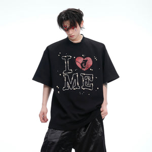 Close-up side detail showing pearl embellishments on avant-garde streetwear t-shirt
