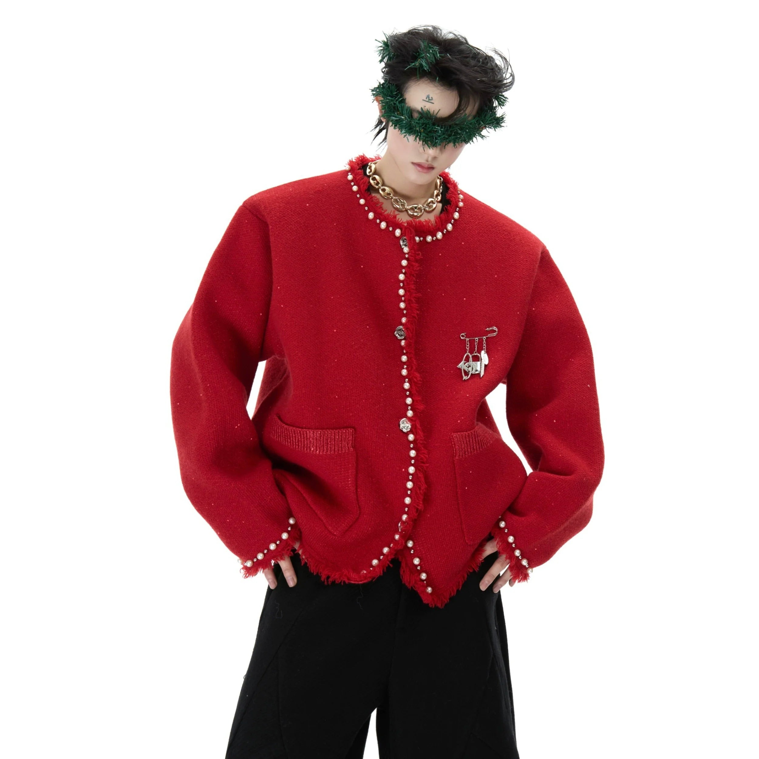 Pearl-embellished knit sweater with festive pearl detailing and subtle textured fabric finish for winter warmth