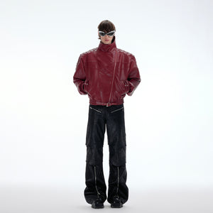 Stylish streetwear model wearing deconstructed spine-wrinkle jacket with metal studs
