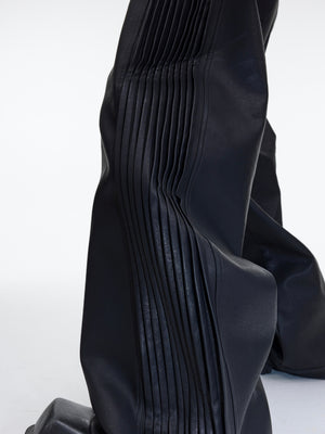 Close-up of the premium matte leather texture on these high-fashion trousers