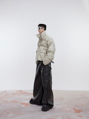 Styling demonstration showing how to layer this fashion-forward PU leather puffer jacket
