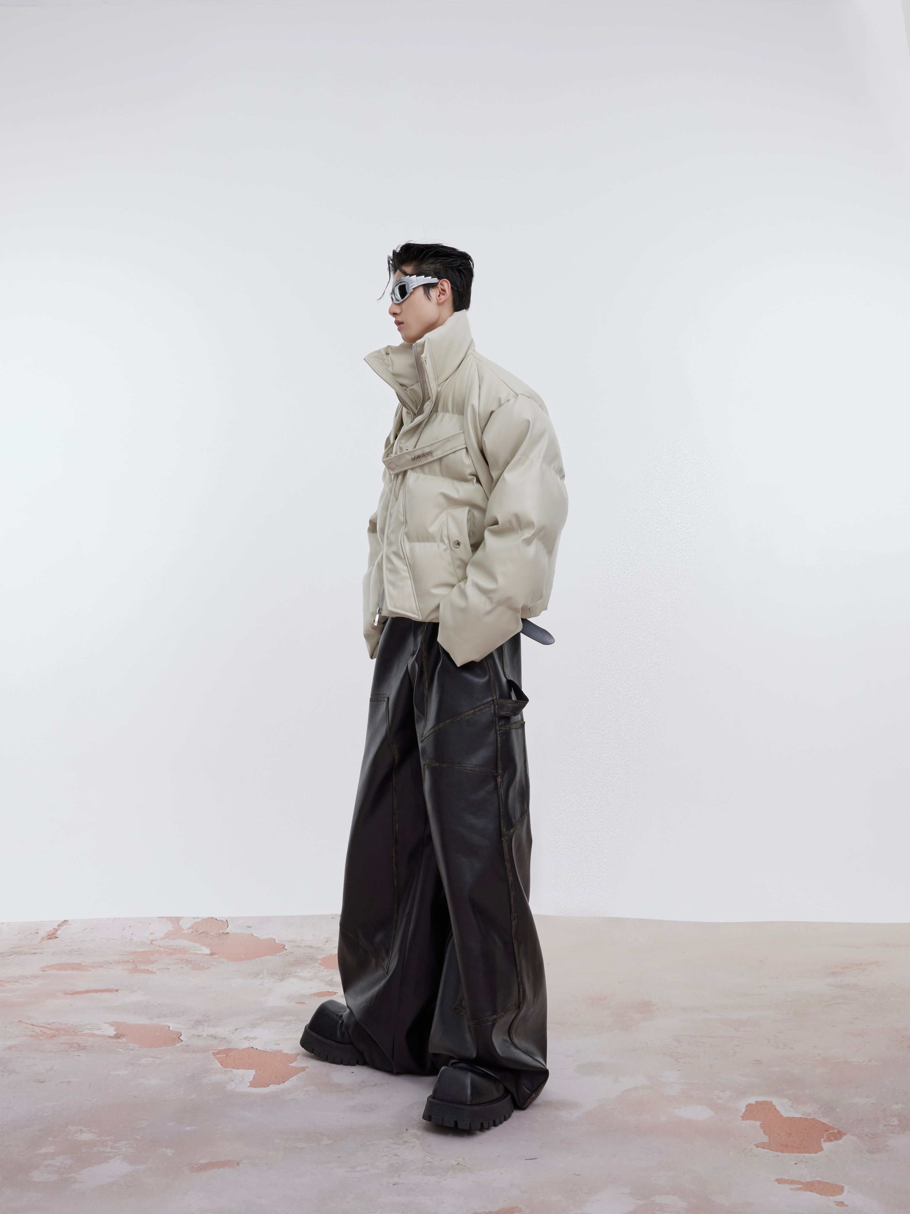 Styling demonstration showing how to layer this fashion-forward PU leather puffer jacket