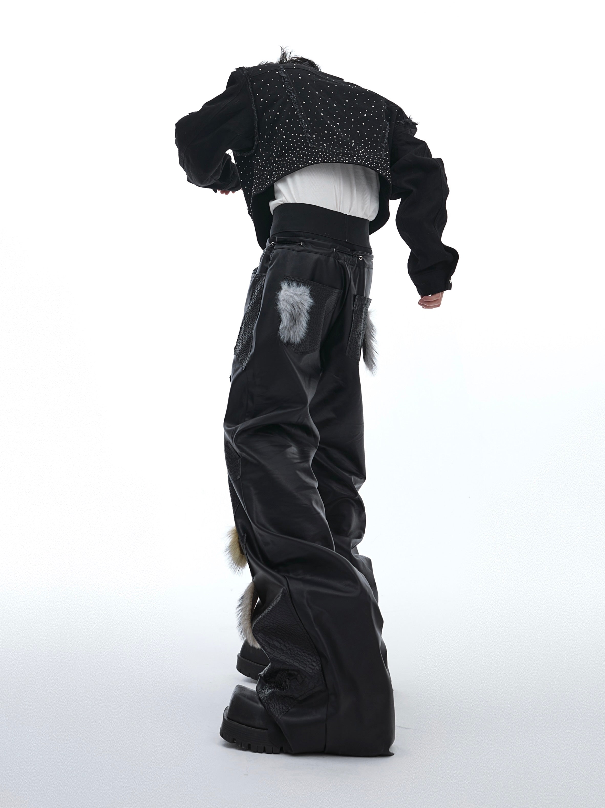 Statement-making punk pants with irregular 3D pleats and avant-garde streetwear design details