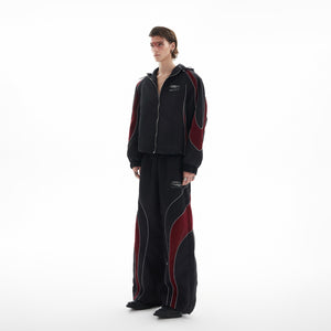 Front view of reflective color-block hooded windbreaker with sporty streetwear design and futuristic edge