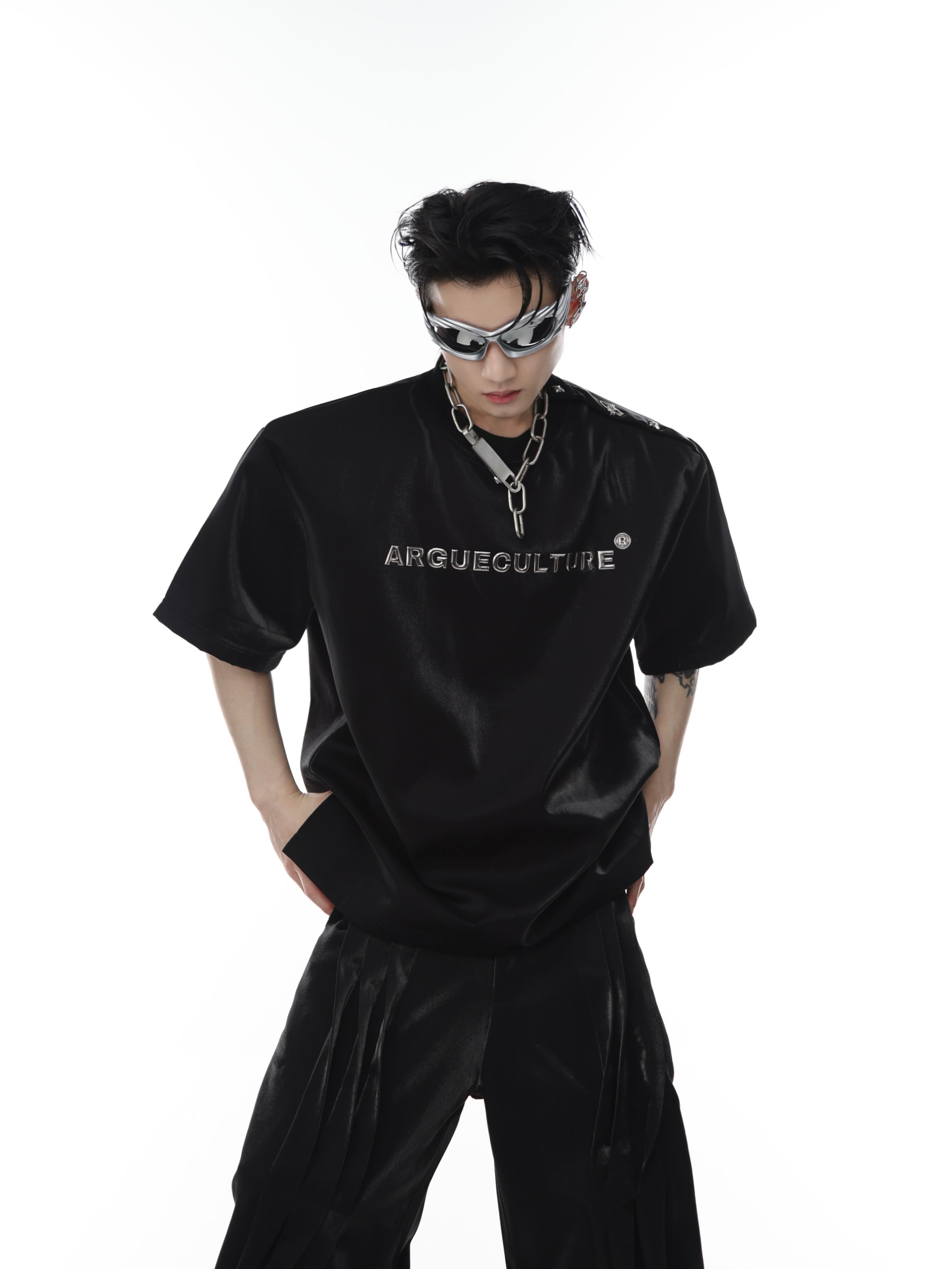 Front view of retro puff sleeve tee with shiny metal buttons and 3D print streetwear design, showcasing liquid metal edge details