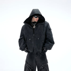 Distressed reversible puffer jacket featuring hood and oversized streetwear design with premium PU leather side