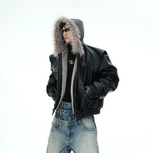Double-face PU leather hooded jacket with plush fur collar, showing streetwear style with metallic logo detail