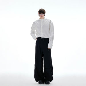 Back view of luxury pearl-embellished blouse featuring breathable fabric and sophisticated design