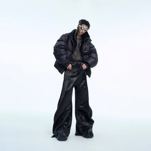 Side angle showing the comfortable fit and movement of scimitar cut wide-leg trousers