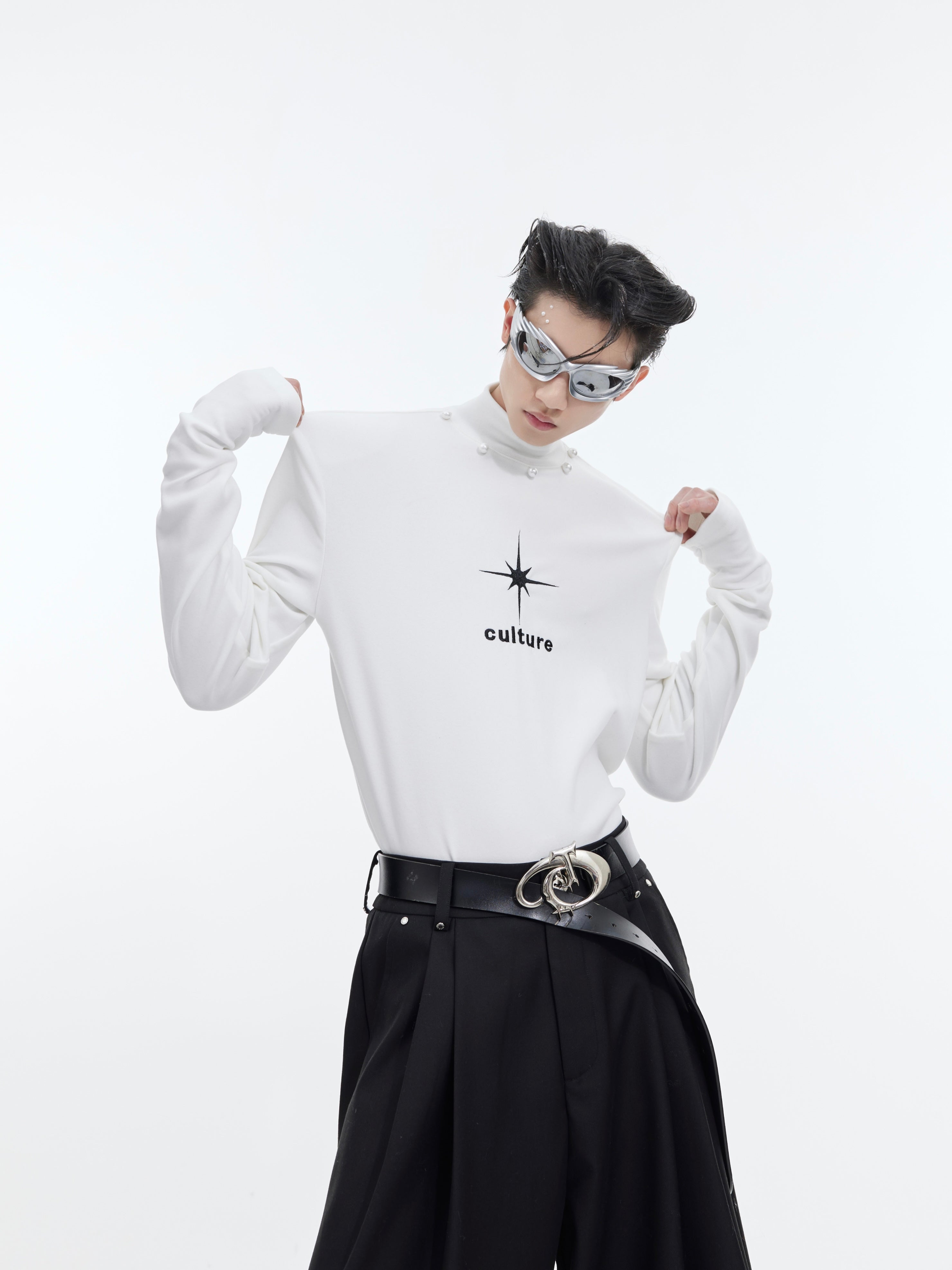 Black slim-fit mock neck long sleeve tee with edgy streetwear design and high-density fabric