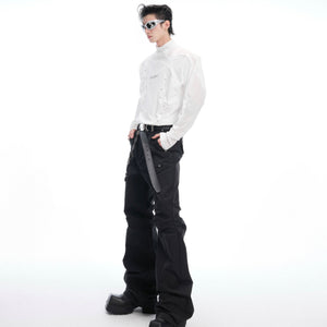 Close-up of stud embellishments and breathable mesh fabric on this contemporary streetwear top