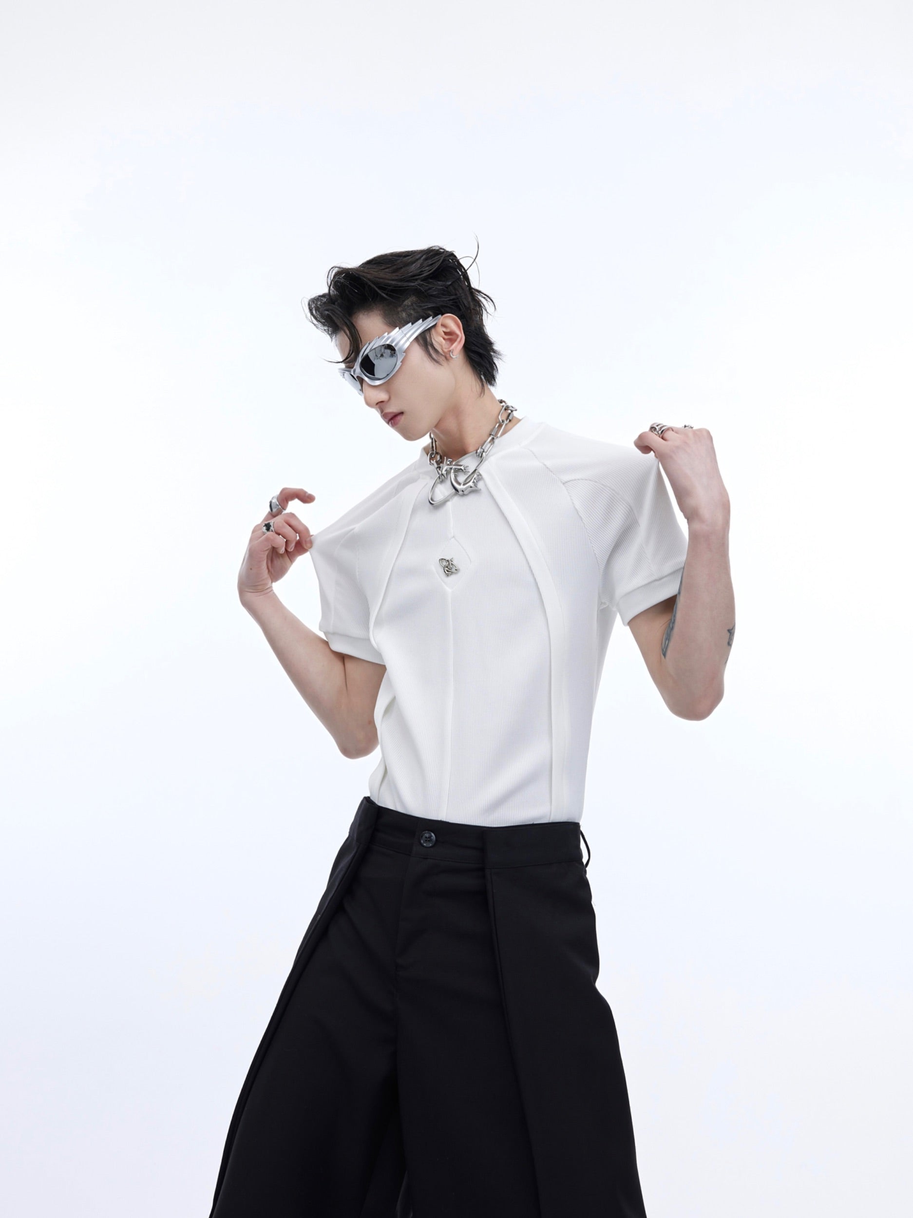 Back view of the artistic unisex tee featuring asymmetrical design elements and premium fabric texture