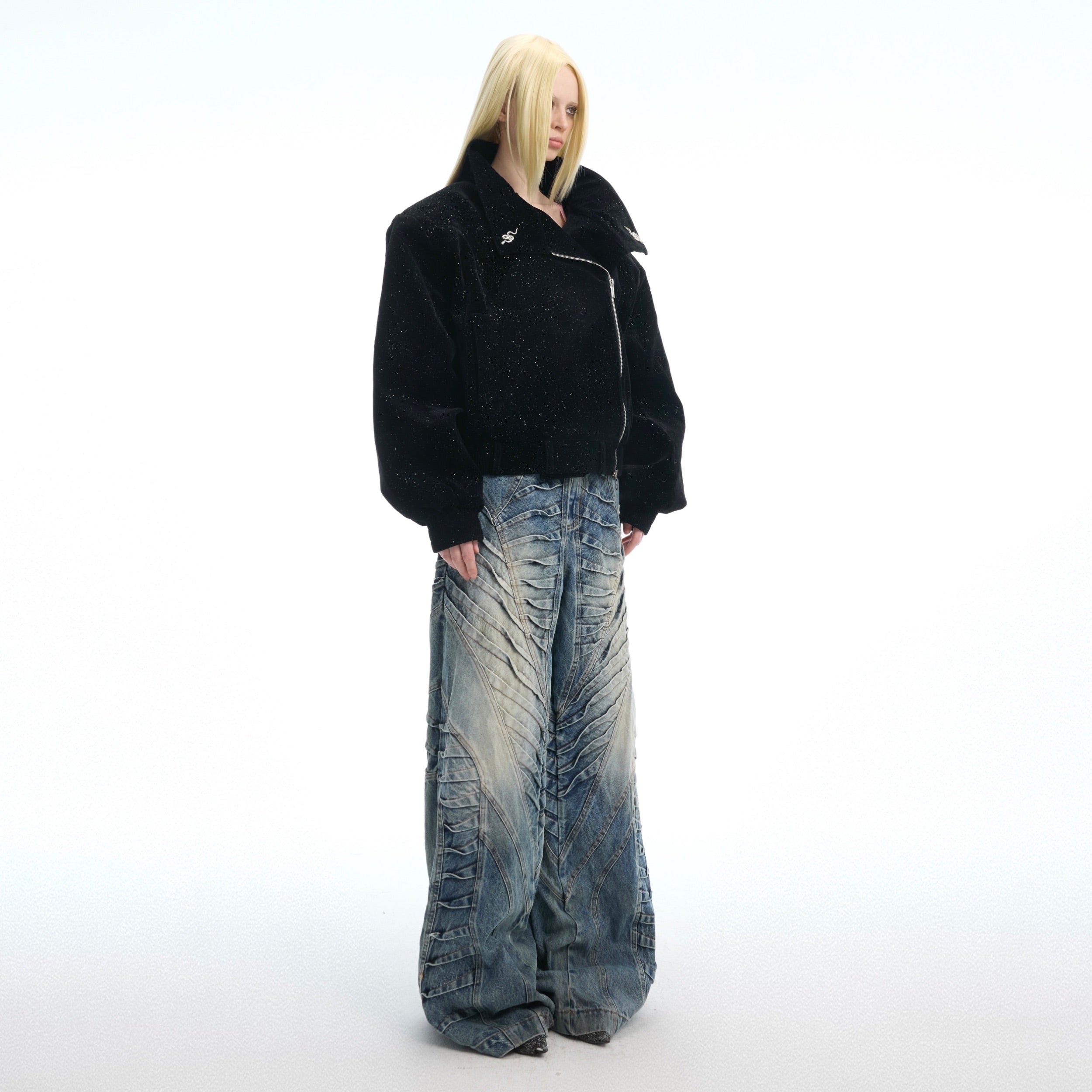 Stylish model wearing the statement jacket featuring snakeskin aesthetic and diagonal zipper streetwear
