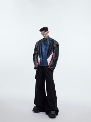 Close-up of spliced streamer details on comfortable oversized pants, perfect for street-ready style