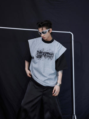 Close-up of the innovative spliced segmentation design on this statement streetwear t-shirt with deconstructed tailoring