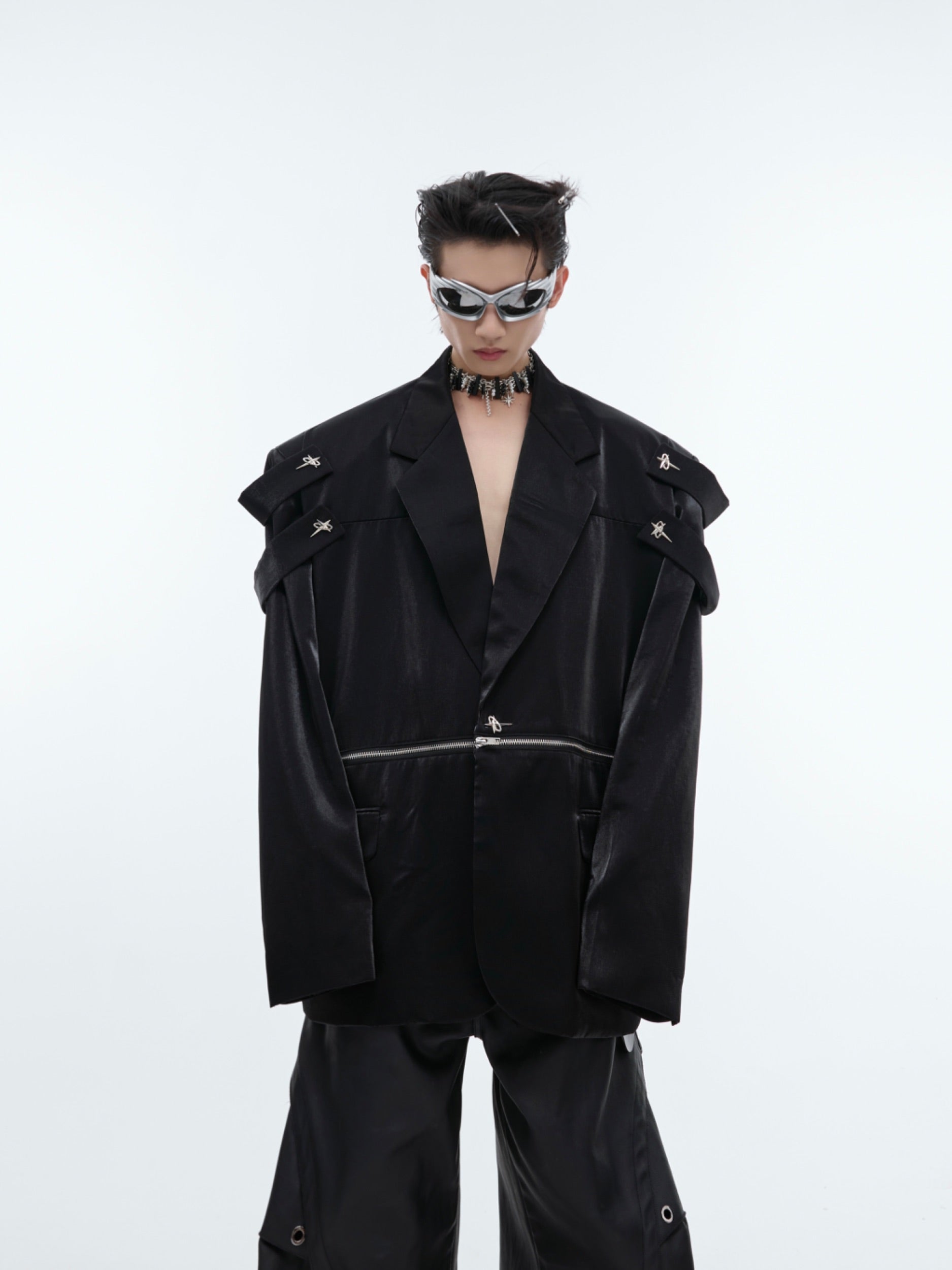 Close-up of innovative splicing details on this avant-garde mens suit jacket with urban edge