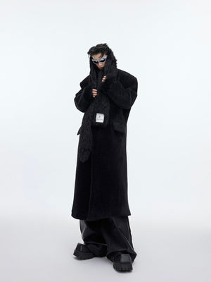 Male model wearing oversized tweed coat showing the perfect drape and relaxed streetwear silhouette