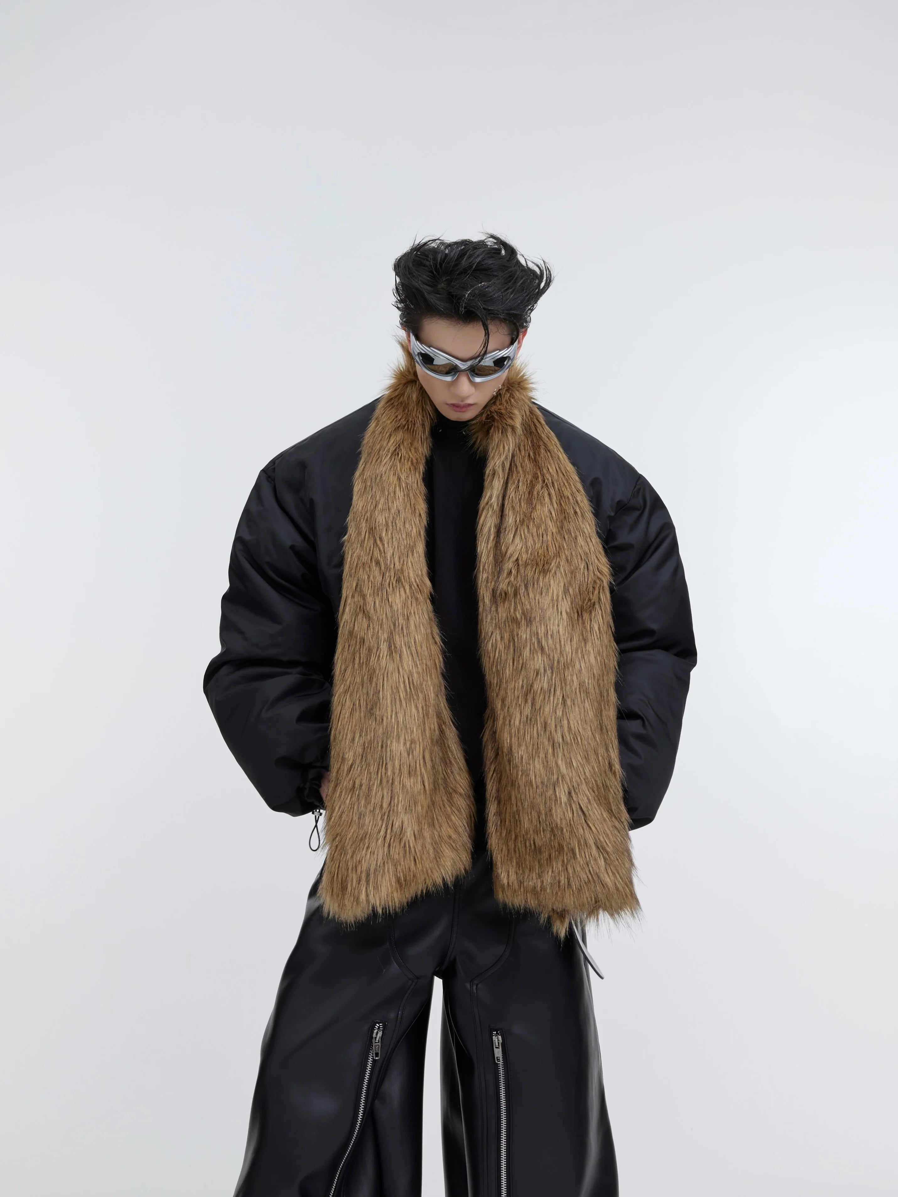 Oversized streetwear puffer coat with detachable faux fur scarf, showcasing urban winter fashion