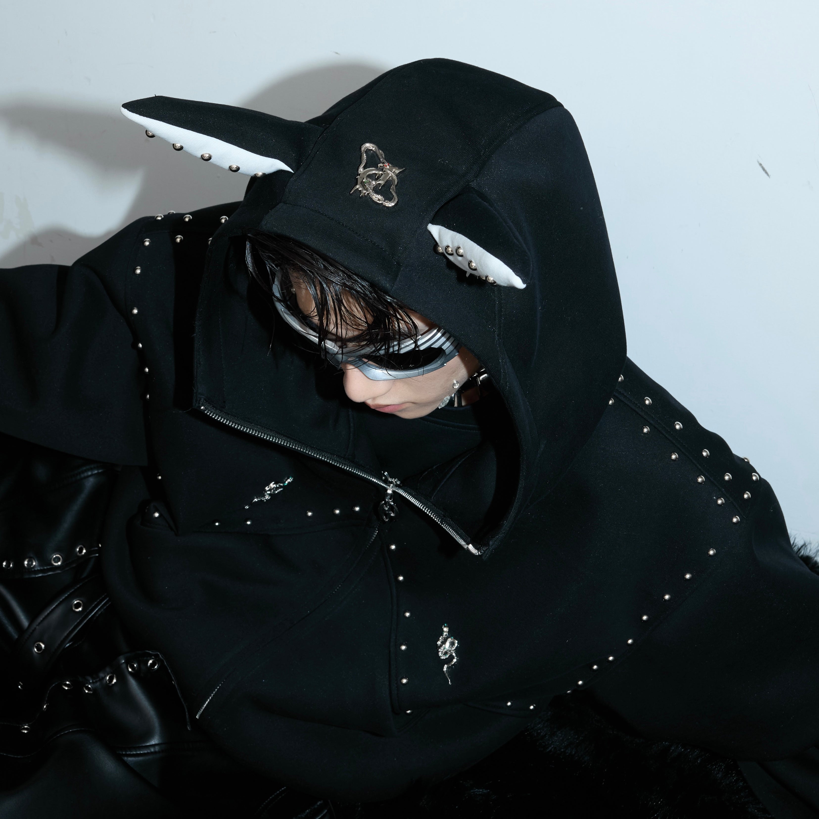 Detailed back view of couple jacket showcasing punk-inspired doberman graphic and quality stitching