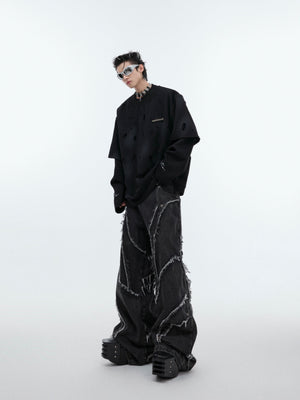 Back view featuring metal logo accents on this distressed long-sleeve hoodie for urban fashion lovers