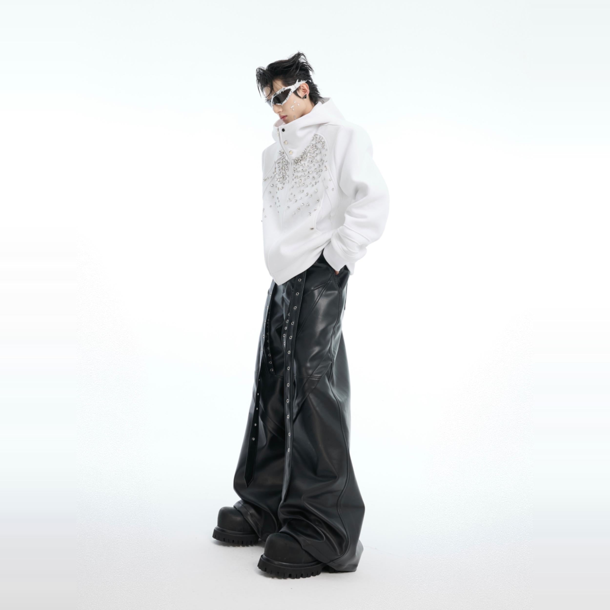 Fashion model wearing the oversized glitter-detailed hoodie showing perfect spring streetwear look