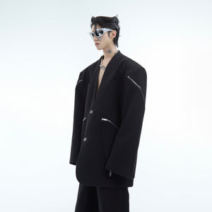 Side angle showing slim fit of modern no collar blazer with unique deconstructed design and premium fabric
