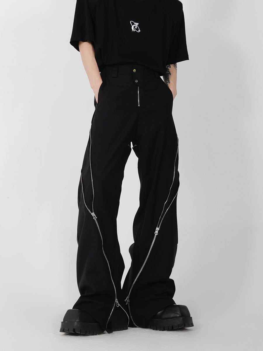 Side view of distressed flared pants showing the urban streetwear silhouette and premium fabric drape