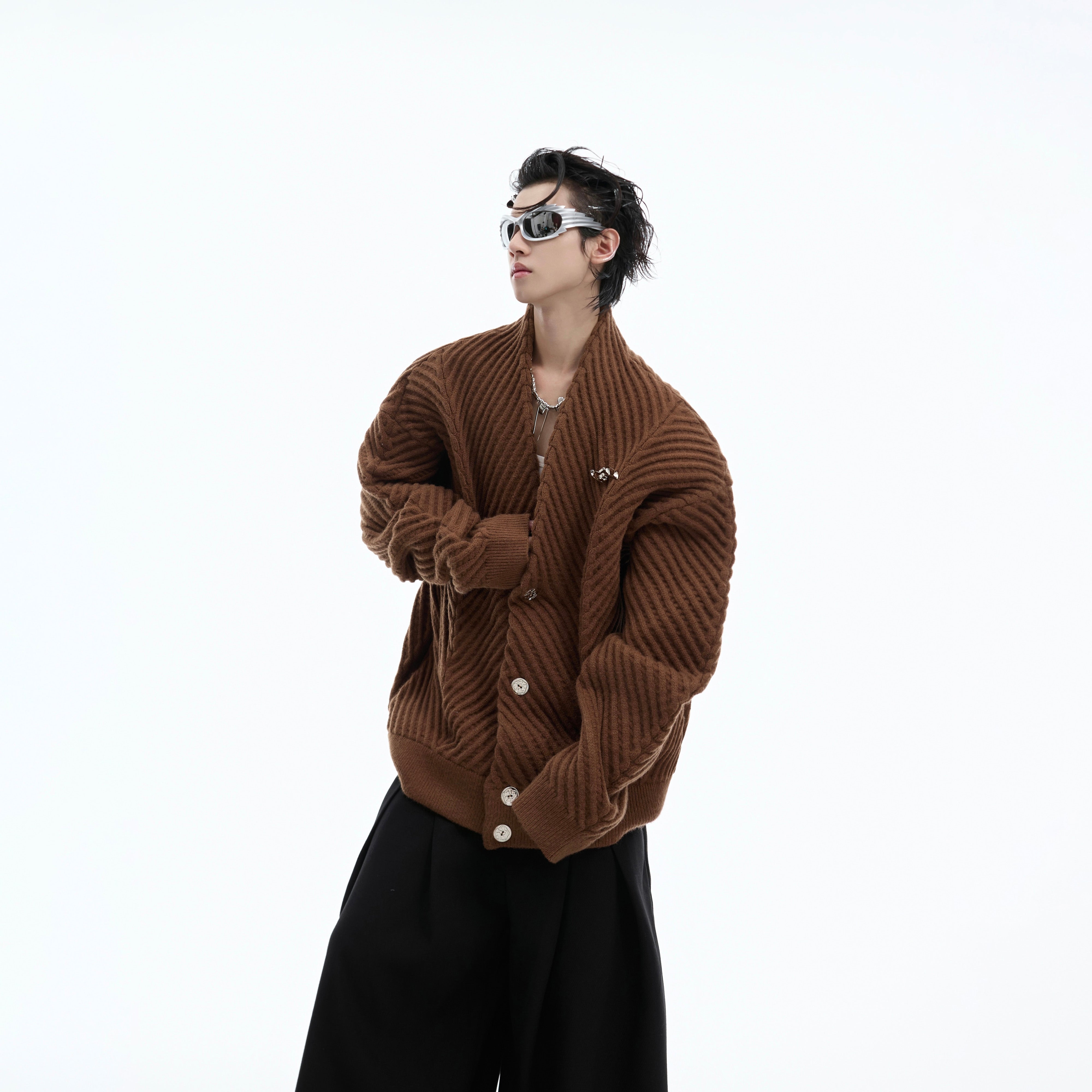 Close-up of the signature ribbed v-neck on this oversized knit sweater for urban fashion