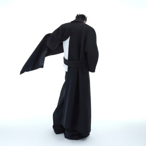 Back view of stylish streetwear wool overcoat with oversized fit and smooth texture