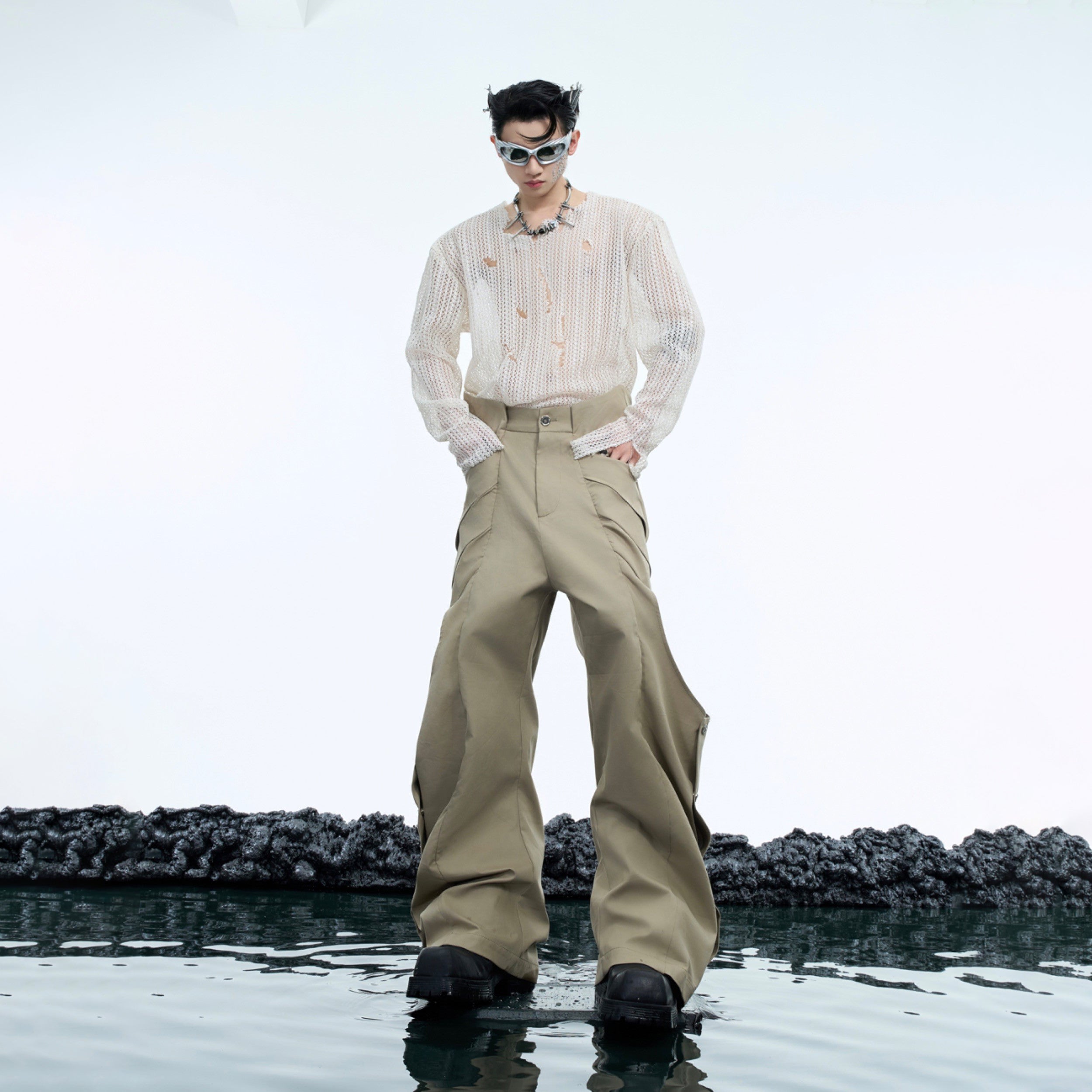 Rear view displaying the special-shaped structure and pleated design of these urban pants