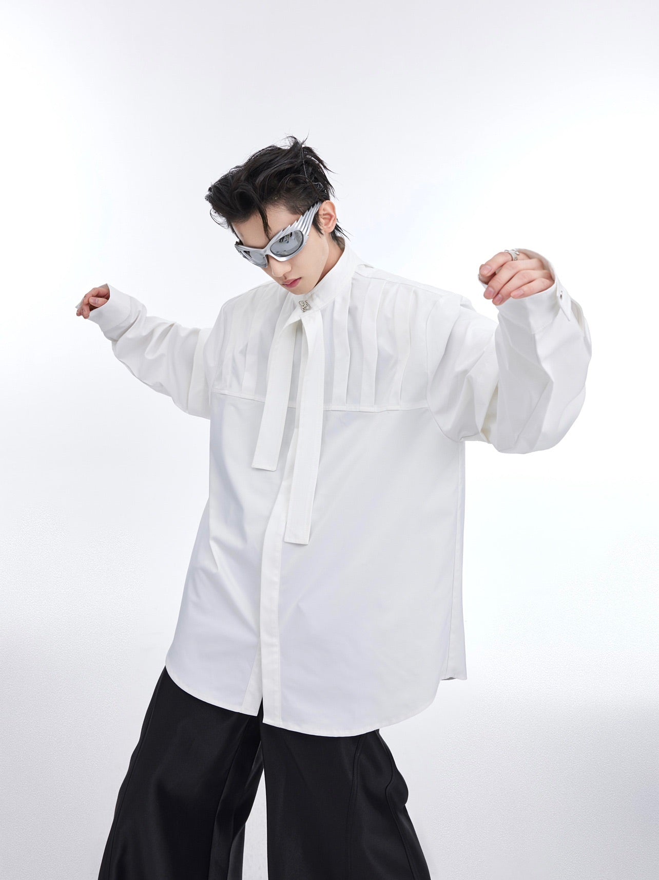 Close-up of premium fabric and craftsmanship on deconstructed long sleeve streetwear shirt