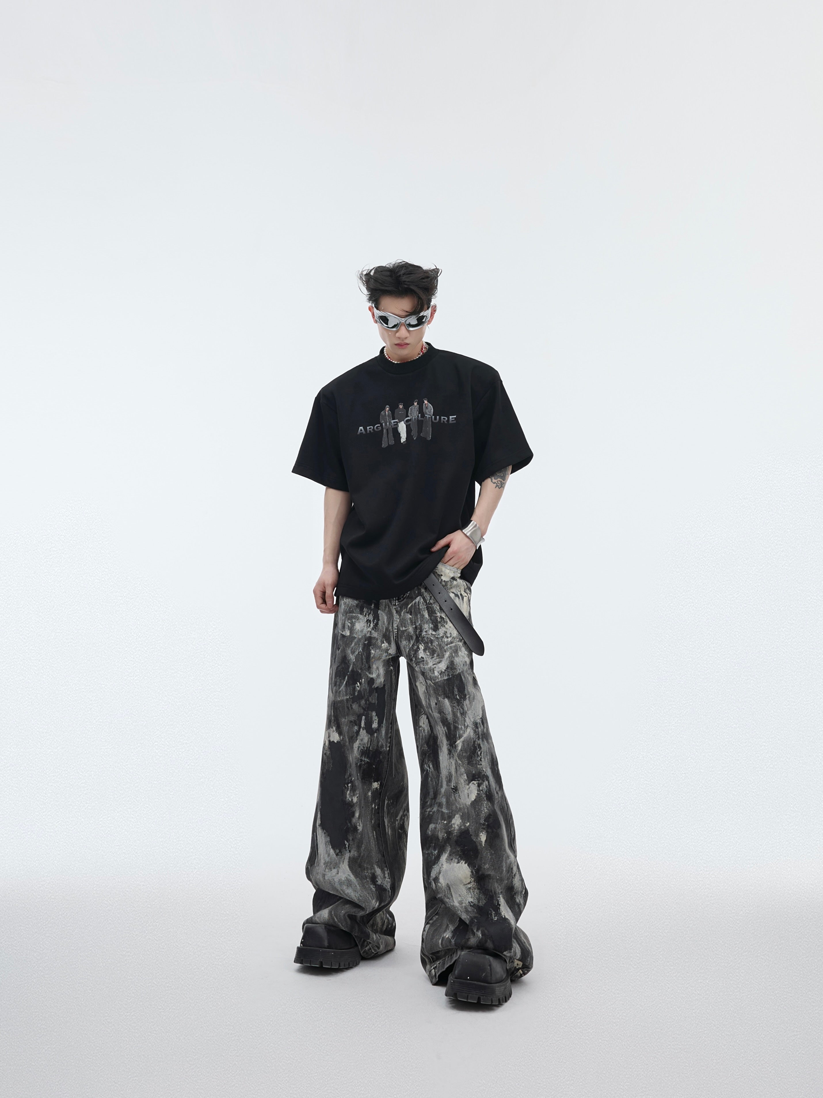 Side angle view of the graphic print oversized tee showing its relaxed summer-ready fit