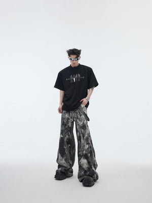 Side angle view of the graphic print oversized tee showing its relaxed summer-ready fit