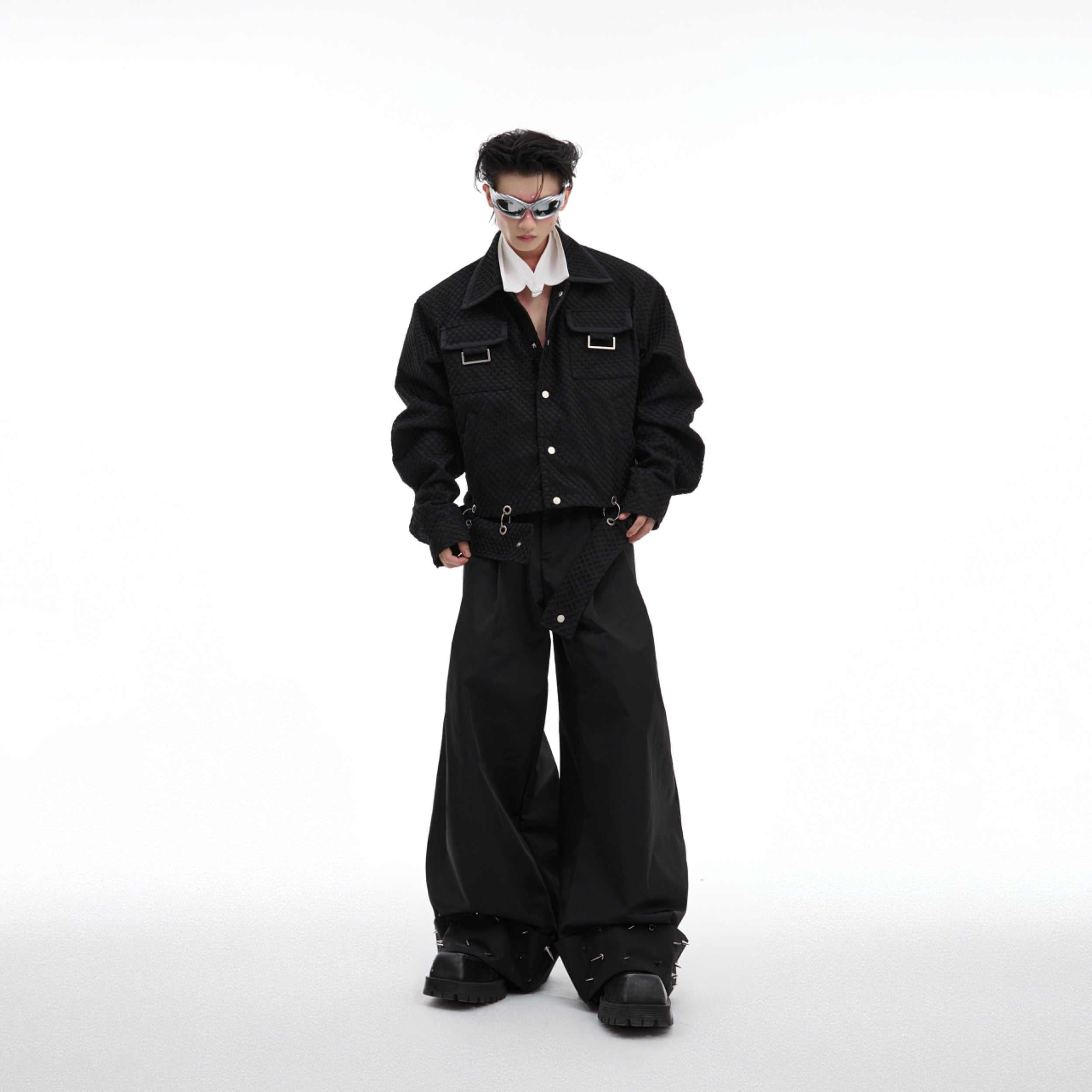 Fashion-forward textured leather jacket with artistic deconstructed panels for urban style