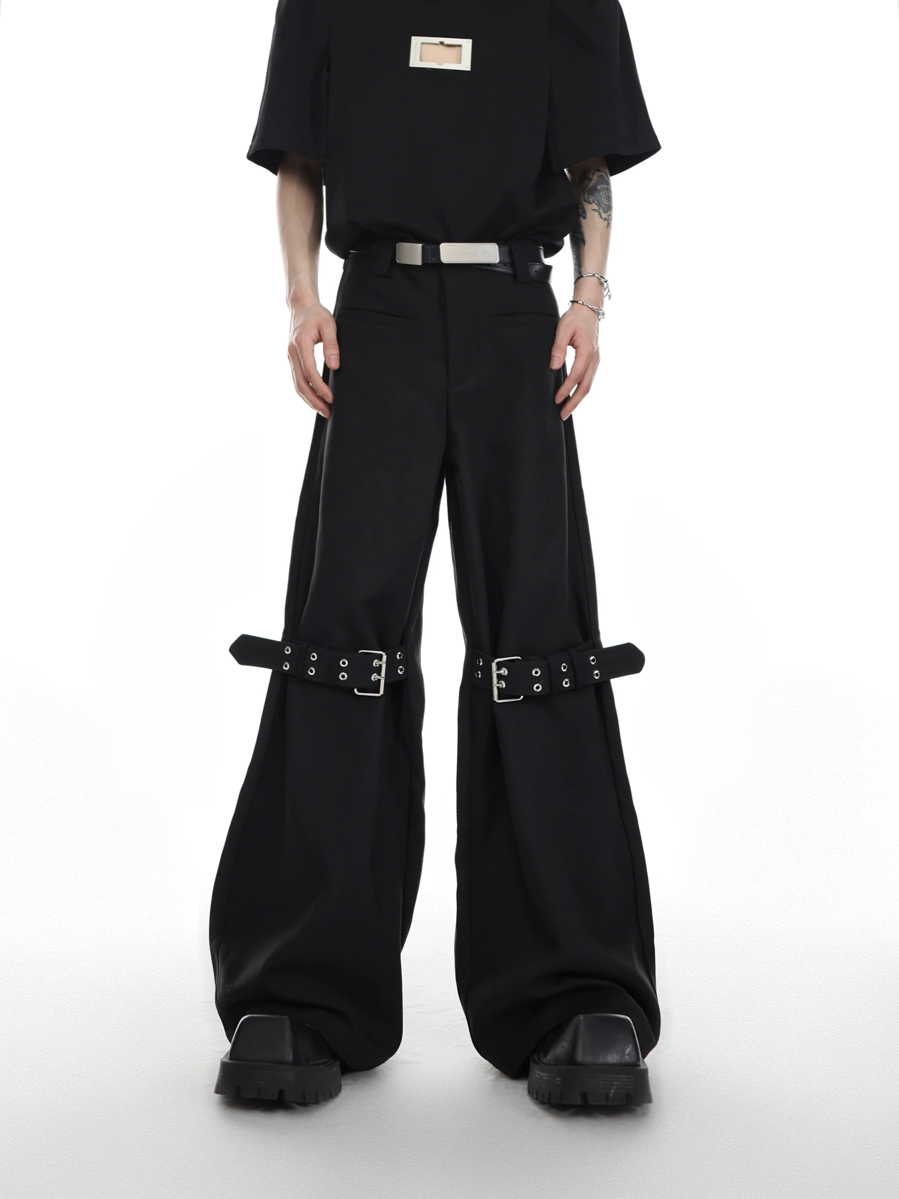 Textured twill tapered trousers with punk-inspired lace-up detailing and wide-leg silhouette for streetwear looks